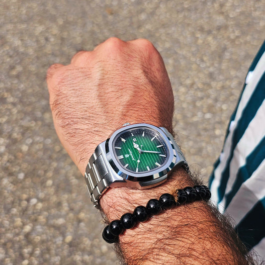 Close-up of POEDAGAR 613 luxury men's watch with stainless steel band and square case, showcasing European classic style.