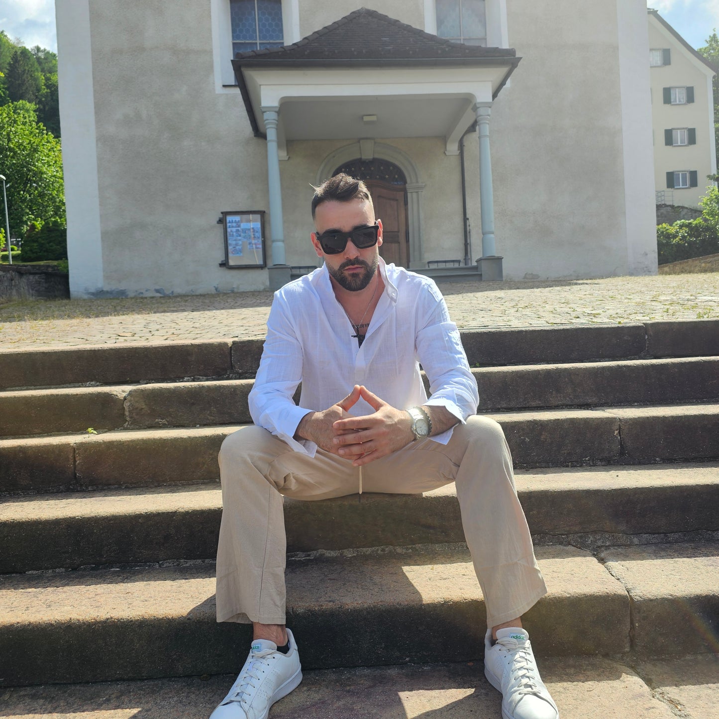 White variant of the men's 100% linen stand collar Henley shirt styled for casual spring/fall wear, showcasing the regular fit