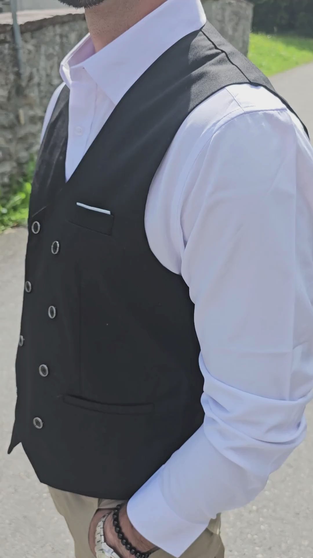 Front view of men's classic white V-neck buttoned vest with tailored fit.